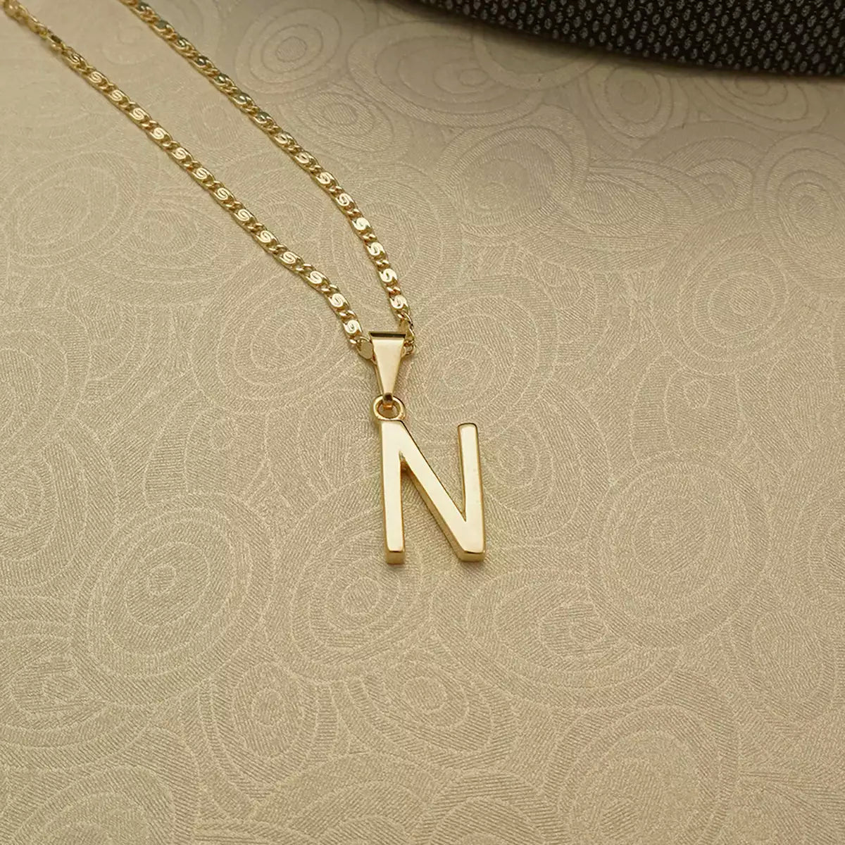 Dije letra N