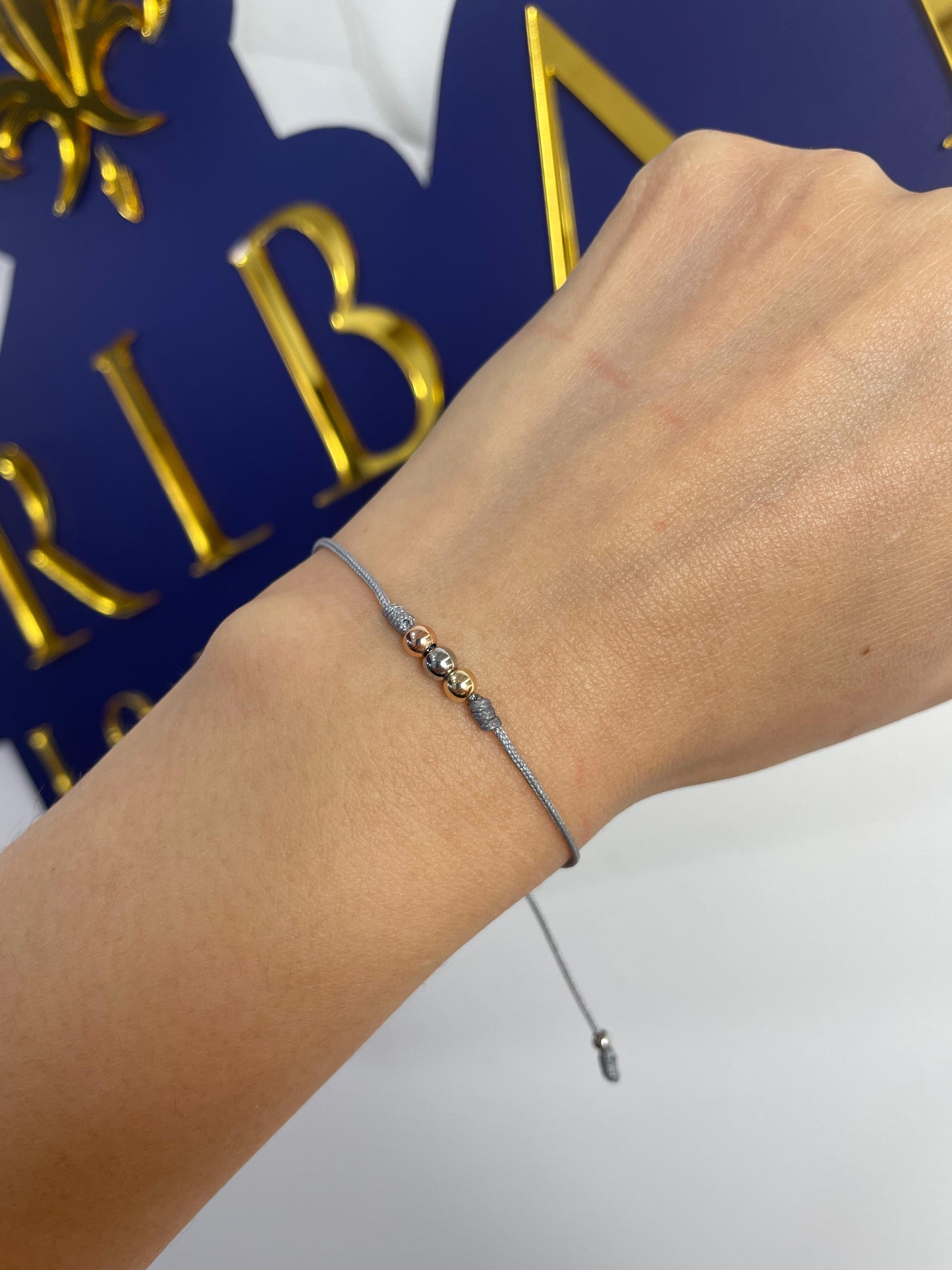 Pulsera 3 Oros Especial en Hilo Oro Laminado 18 K Gris
