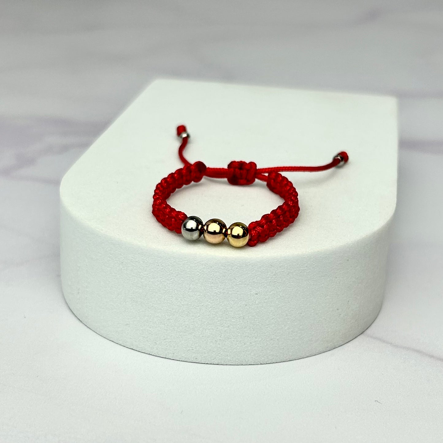 Pulsera Tejida Pqña Tres Balin liso dorado Tonos de Oros Oro Laminado 18 k RJ