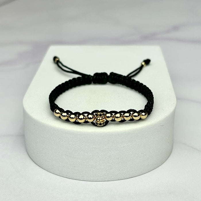 Pulsera Tejida Balin Liso con Hrjs Rondel Italy y circones negro Oro Laminado 18 K NG
