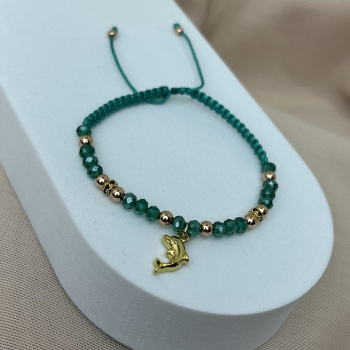 Pulsera Murano Agua Marina con Delfin, Balin Rosa y Rondel Circón Negro Oro Laminado 18 K