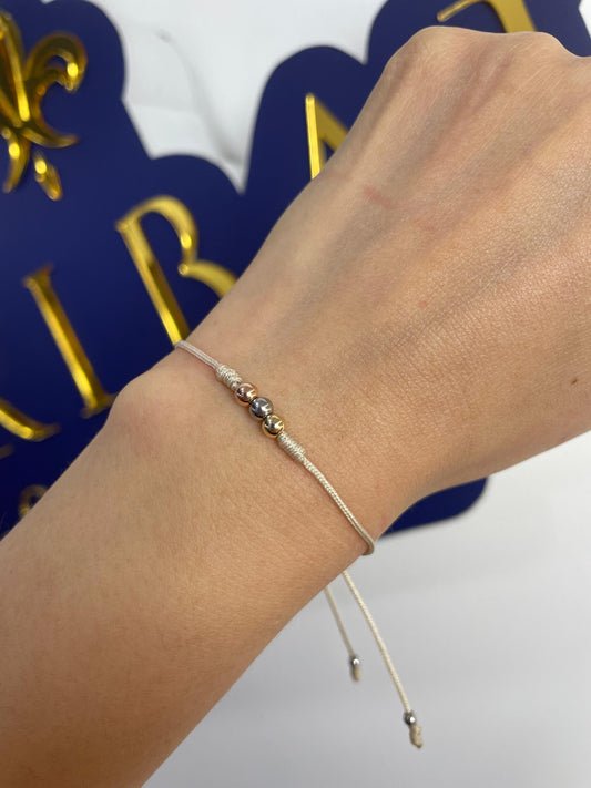 Pulsera 3 Oros Especial en Hilo  Oro Laminado 18 K Beige